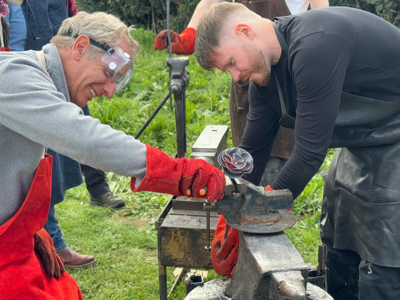 Robson Green learning the art of blacksmithing with The Witty Smith by forging an iron rose on Robson Green's Weekend Escapes show